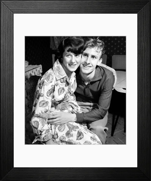 Framed Print : Mr. and Mrs. Health seen here at home discussing how he proposed marriage to her