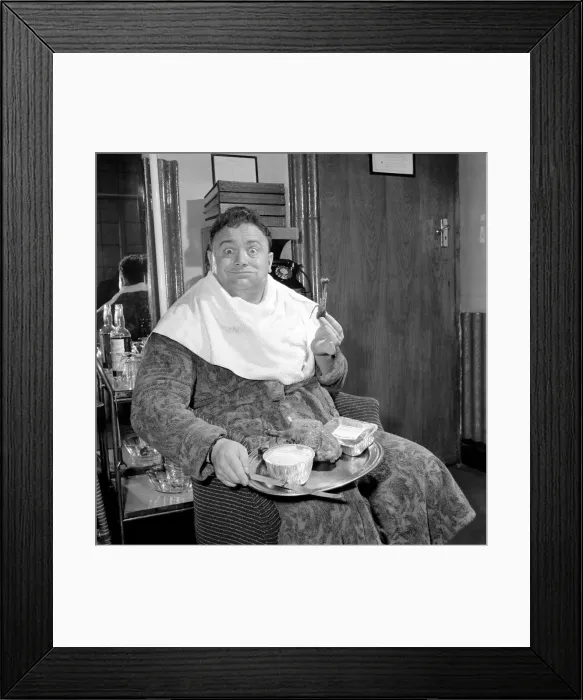 Framed Print : Actor and singer Harry Secombe seen here ordering and then eating a meal order from
