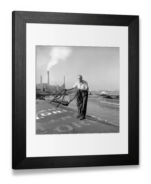 Framed Print : Thames barge man Ernest Murray seen here at work on the river. Circa 1960