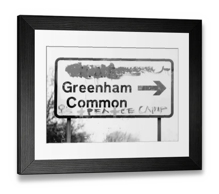 Framed Print : Demonstrations The sign that points the way to Greenham Common also points the way to Framed Print : Demonstrations The sign that points the way to Greenham Common also points the way to