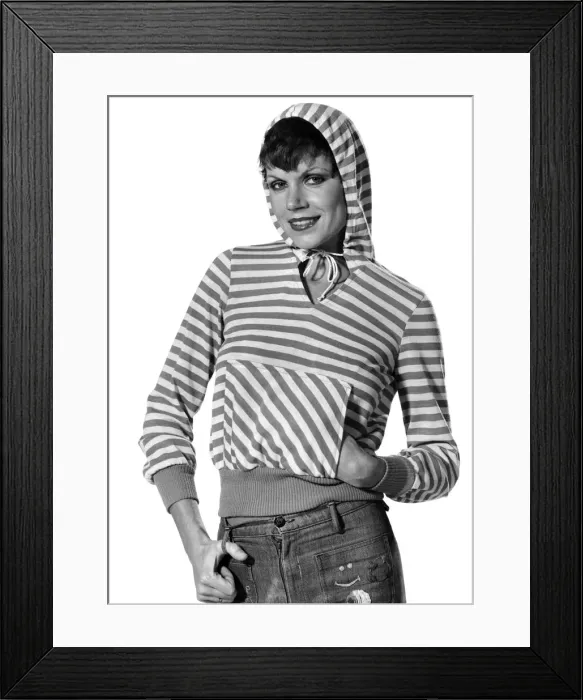 Framed Print : Left: Pink and white striped hooded top with unusual front nmuffleri pockets at the front