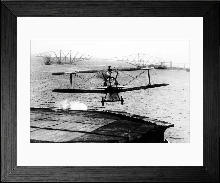 Framed Print : World War One A biplane takes off from the deck of the aircraft carrier HMS Argus in Framed Print : World War One A biplane takes off from the deck of the aircraft carrier HMS Argus in