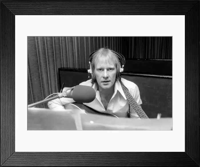 Framed Print : Actor Dennis Waterman, seen here in the recording studio with his guitar. December 1975 Framed Print : Actor Dennis Waterman, seen here in the recording studio with his guitar. December 1975