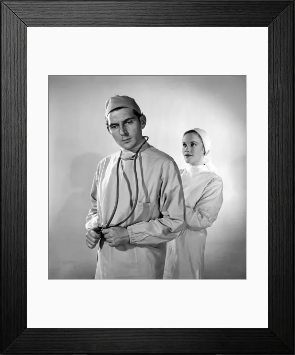 Framed Print : When in Nurse pulls in Love with a doctor'. Posed by models Framed Print : When in Nurse pulls in Love with a doctor'. Posed by models