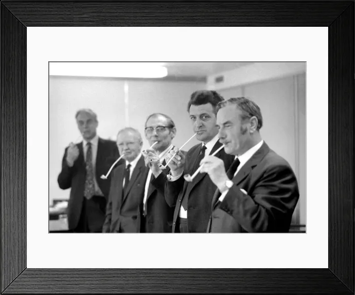 Framed Print : Competitios in the British National Pipe Smoking Championship puffing on their pipes Framed Print : Competitios in the British National Pipe Smoking Championship puffing on their pipes