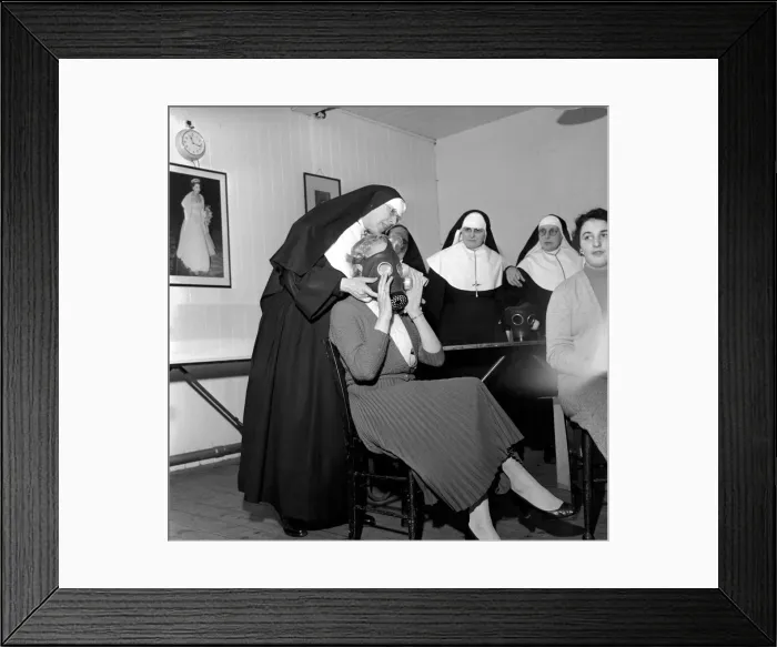 Framed Print : The Nuns at the Convent of Santa Maria Luton, have formed their own civil defence group