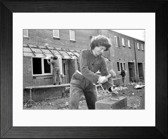 Framed Print : Women bricklayer working on construction site. February 1987 Framed Print : Women bricklayer working on construction site. February 1987