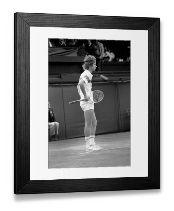 Framed Print : Sport: Tennis. John McEnroe gets an tied up in his Centre Court Wining Wimbledon Semi