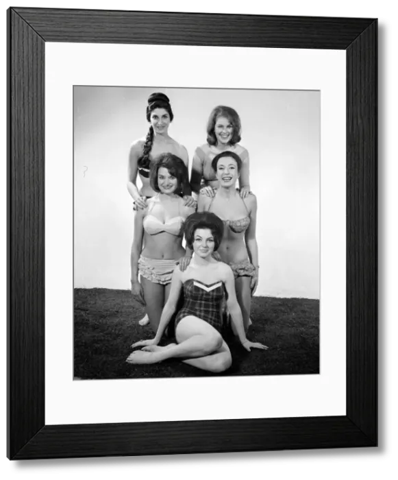 Framed Print : Fashion shoot for models wearing swimsuits. They are back row left to right Framed Print : Fashion shoot for models wearing swimsuits. They are back row left to right