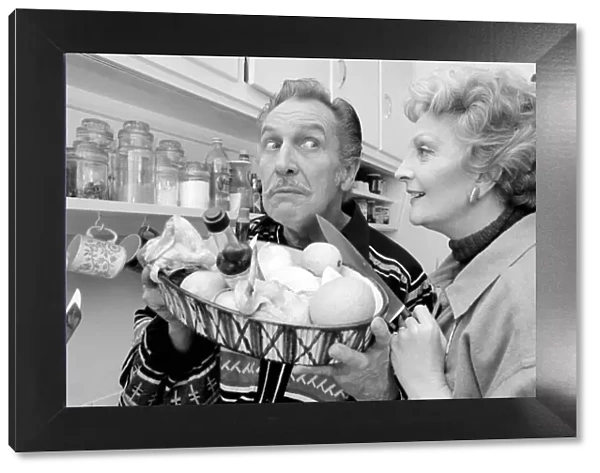 Actor and chef Vincent Price and his wife Coral seen here in the kitchen. May 1975