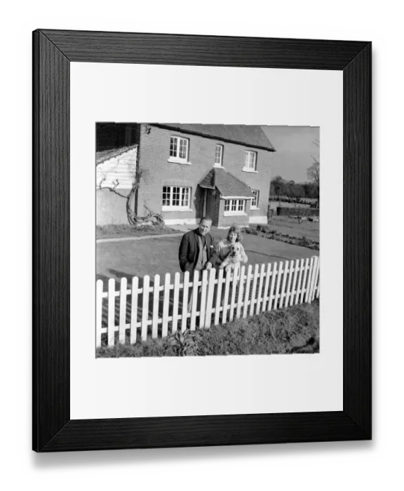 Framed Print : TV actor Hugh Lloyd seen here at home with his wife and pet dog. 1960 A1098-005