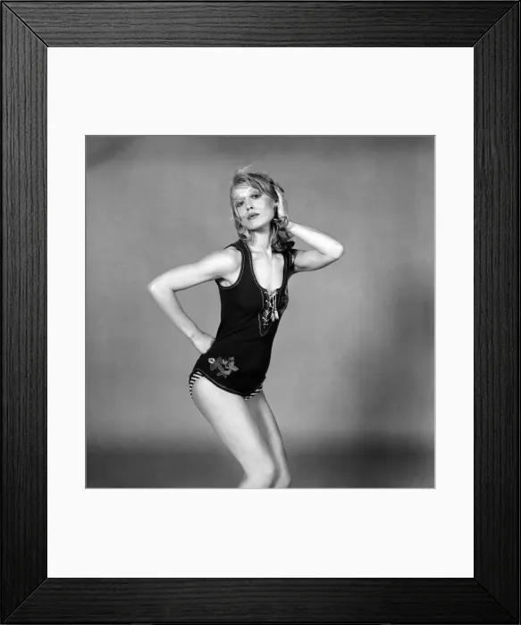 Framed Print : Glamour model Elena wearing a swimming costume April 1975 Framed Print : Glamour model Elena wearing a swimming costume April 1975