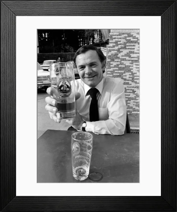 Framed Print : A man drinking a pint of beer in Munich, West Germany May 1975