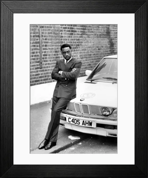 Framed Print : British middleweight champion boxer Nigel Benn with his BMW car March 1988 Framed Print : British middleweight champion boxer Nigel Benn with his BMW car March 1988