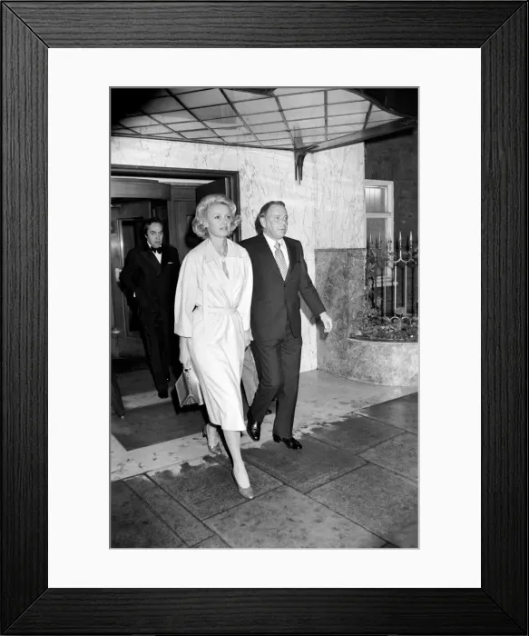 Framed Print : Frank Sintara and his girlfriend Barbara Marx leaving Claridges on the way to Mirabellas