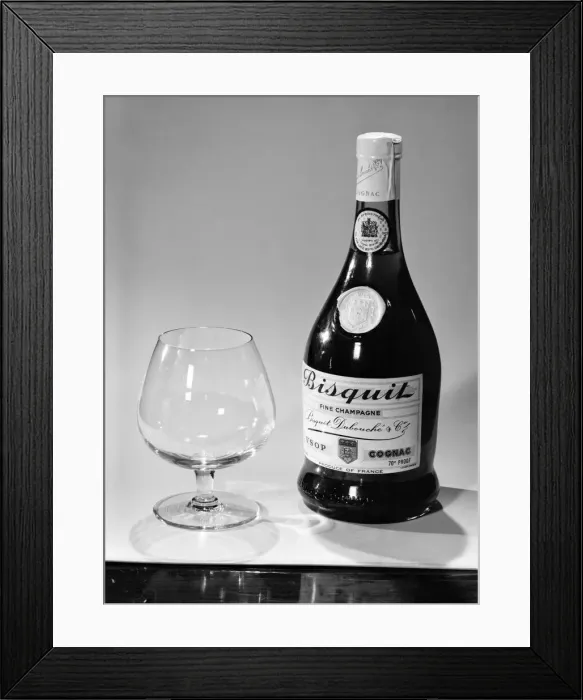 Framed Print : Bottles of wines and spirits with glasses. 1959 D69-006 Framed Print : Bottles of wines and spirits with glasses. 1959 D69-006