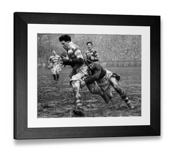 Framed Print : Harry Street of Wigan being tackled by G. Kibroy of Batley
