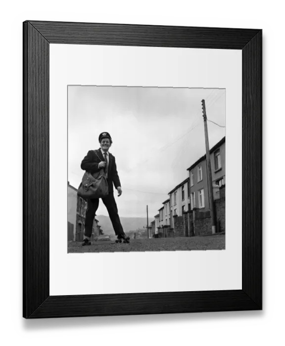 Framed Print : Fred Henderson, 49, makes speedy deliveries with the local post with balletic leaps along Framed Print : Fred Henderson, 49, makes speedy deliveries with the local post with balletic leaps along
