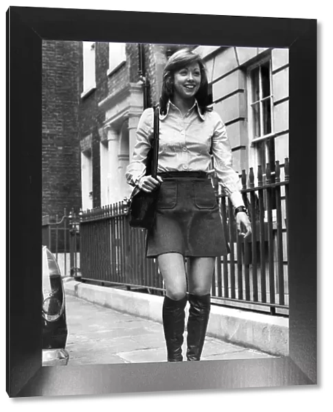 Model Debbie Sullivan aged 17 wearing a striped cotton blouse