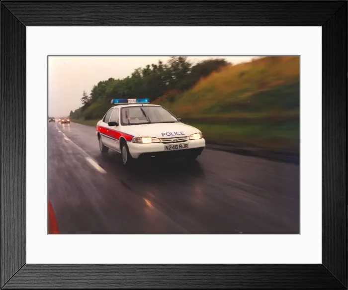 Framed Print : A police officer drives a new rapid response patrol car Framed Print : A police officer drives a new rapid response patrol car