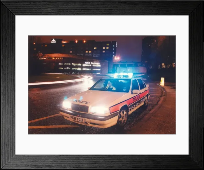 Framed Print : A police officer watches the traffic whizz by in his patrol car 01 / 06 / 95 circa Framed Print : A police officer watches the traffic whizz by in his patrol car 01 / 06 / 95 circa