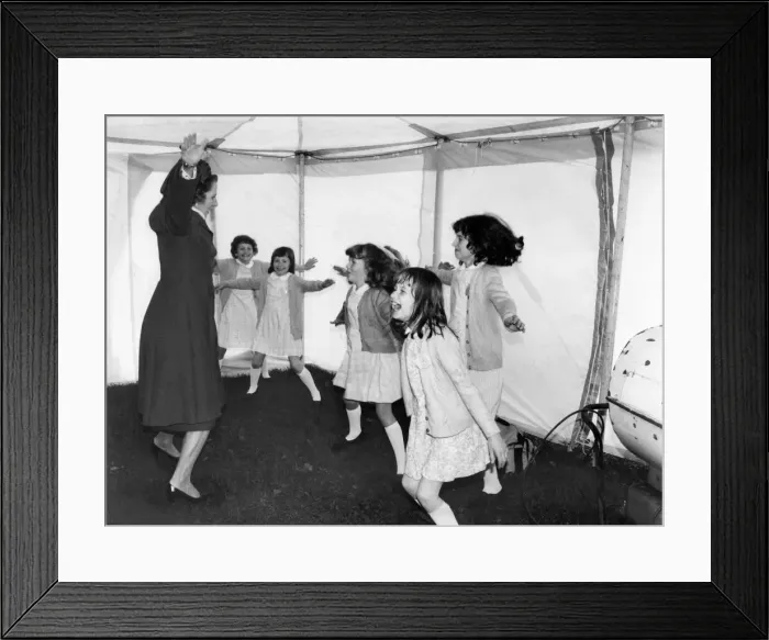 Framed Print : Prime Minister Margaret Thatcher seen here leading a group of children in a session of Framed Print : Prime Minister Margaret Thatcher seen here leading a group of children in a session of