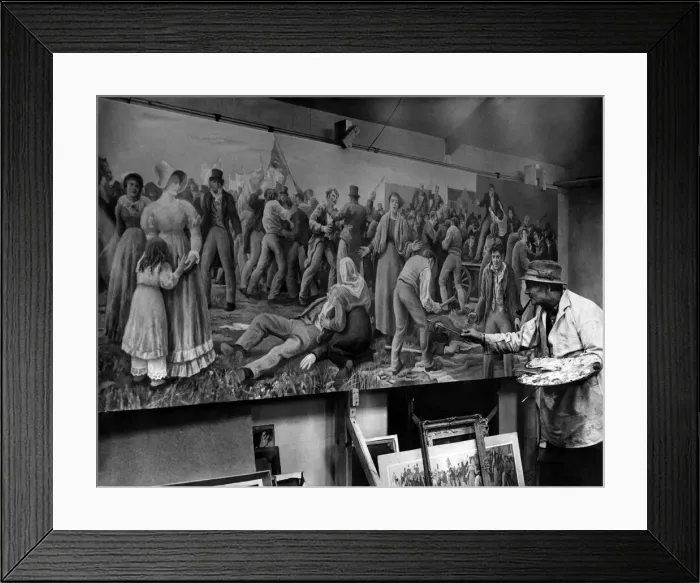 Framed Print : Mr. H. Sherwood Edwards working on a section of his Peterloo mural which is to be hung in Framed Print : Mr. H. Sherwood Edwards working on a section of his Peterloo mural which is to be hung in