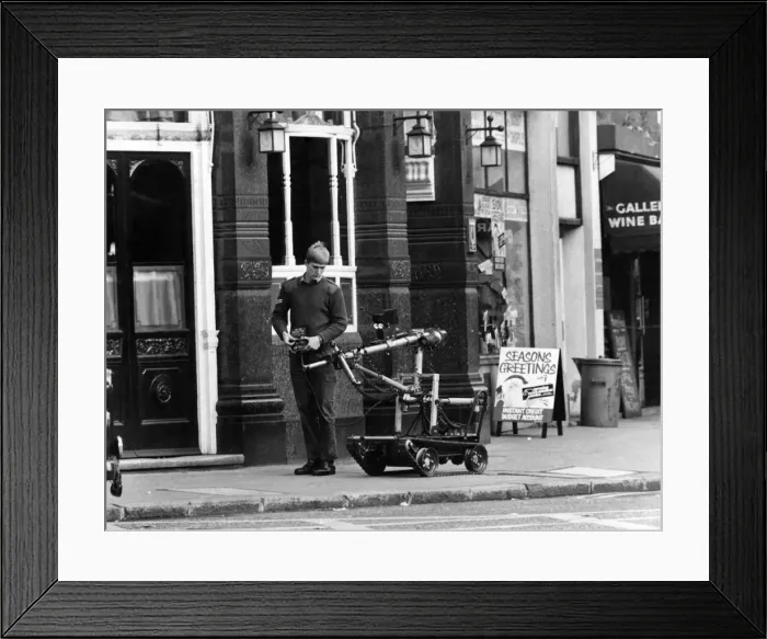Framed Print : A Bomb scare at the old Bailey. An Army Robot in action today as part of the bomb Framed Print : A Bomb scare at the old Bailey. An Army Robot in action today as part of the bomb