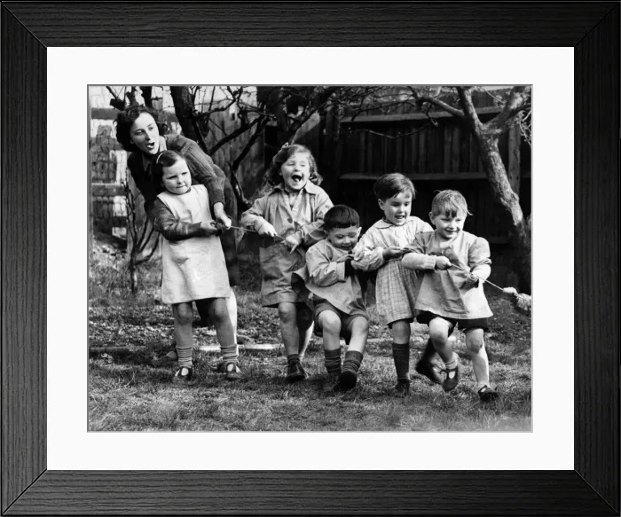 Framed Print : At the Wembley Day Nursery where youngsters are cared for while their mothers are on war