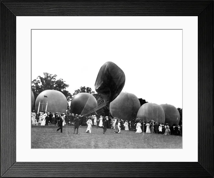 Framed Print : High winds prevent the start of the Hedges Butler Cup. Engineers struggle to deflate Framed Print : High winds prevent the start of the Hedges Butler Cup. Engineers struggle to deflate