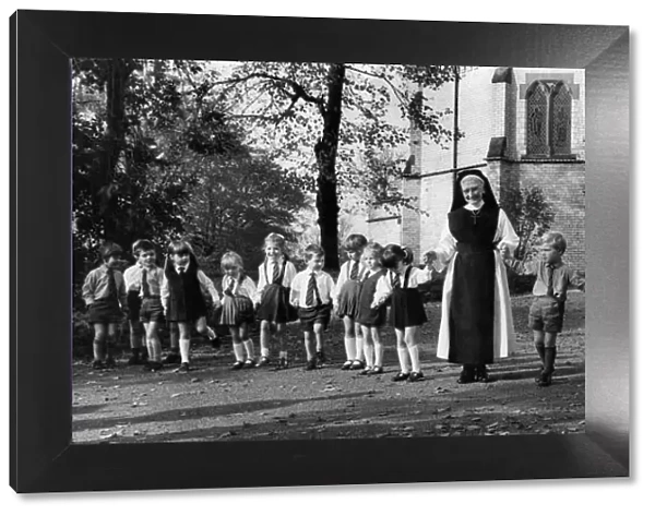 Sister David Power with her pupils at Holly Mount Convent at Tottington, near Bury, Lanes