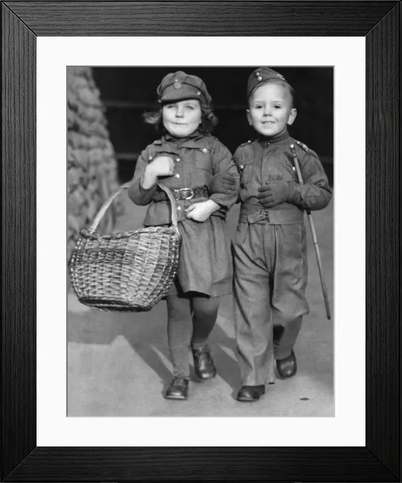 Framed Print : Young children Bev Ransome and Joan Green dressed in military uniform. January 1940 Framed Print : Young children Bev Ransome and Joan Green dressed in military uniform. January 1940