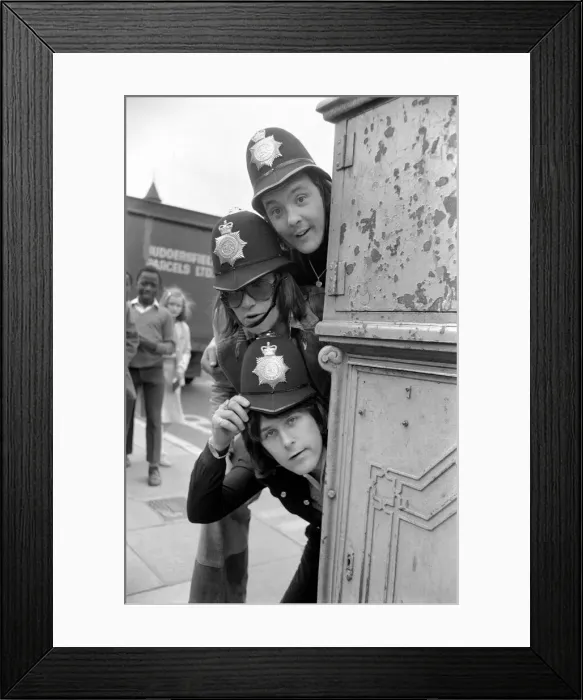 Framed Print : Pop Group Mud'dressed in police helmets May 1975 Framed Print : Pop Group Mud'dressed in police helmets May 1975