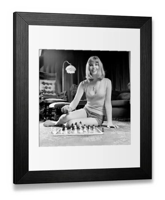 Framed Print : Woman pictured at home playing a game of chess. May 1975