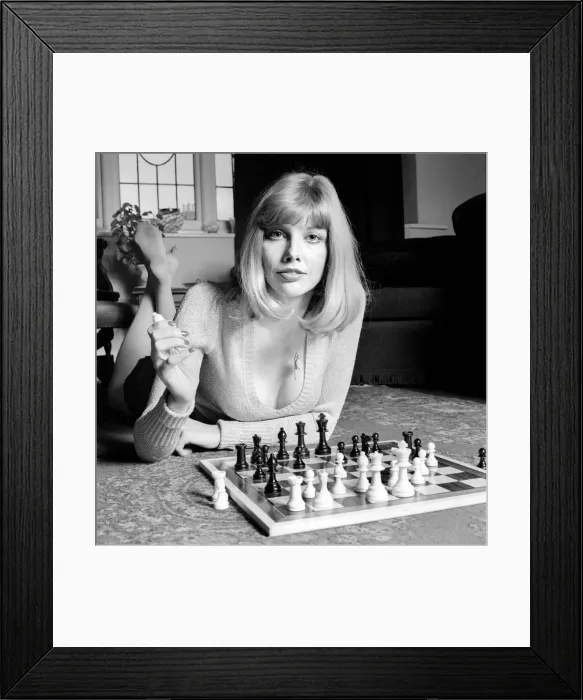 Framed Print : Woman pictured at home playing a game of chess. May 1975 Framed Print : Woman pictured at home playing a game of chess. May 1975