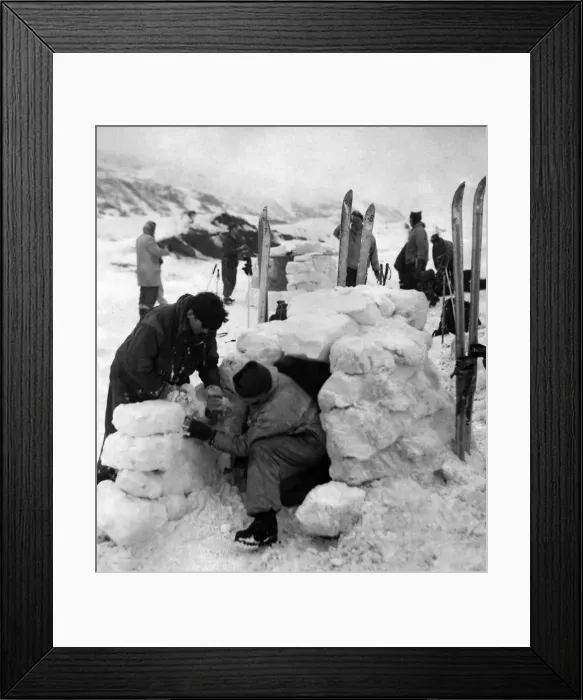 Framed Print : Troops busy cutting out the ice blocks and building the igloos which each houses two men