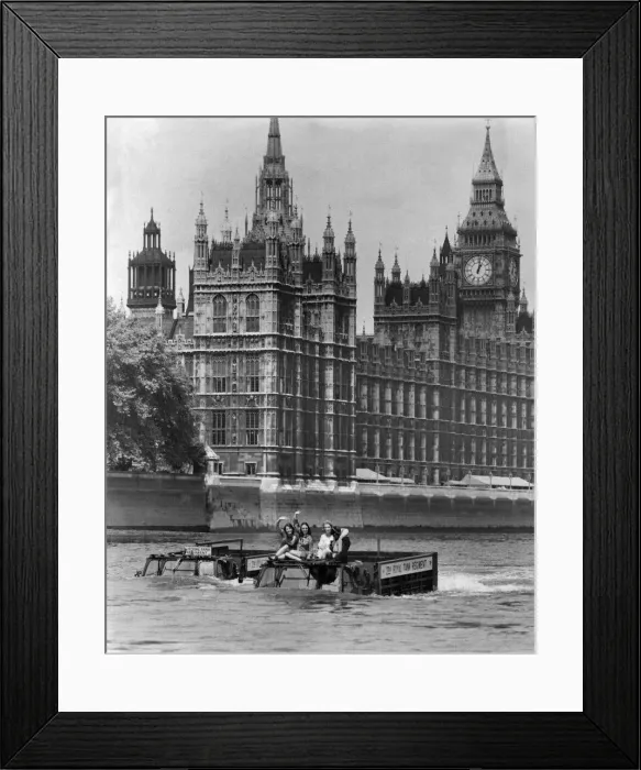 Framed Print : Army Vehicles. Amphibious. Two Army trucks transport three waving women through Framed Print : Army Vehicles. Amphibious. Two Army trucks transport three waving women through