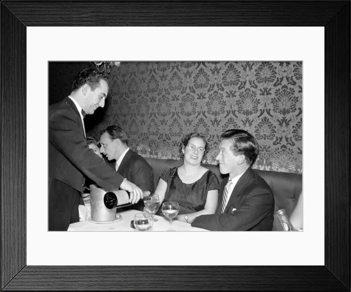 Framed Print : Couple toasting with champaigne Mr. and Mrs. Brown have a celebration drink on their Framed Print : Couple toasting with champaigne Mr. and Mrs. Brown have a celebration drink on their