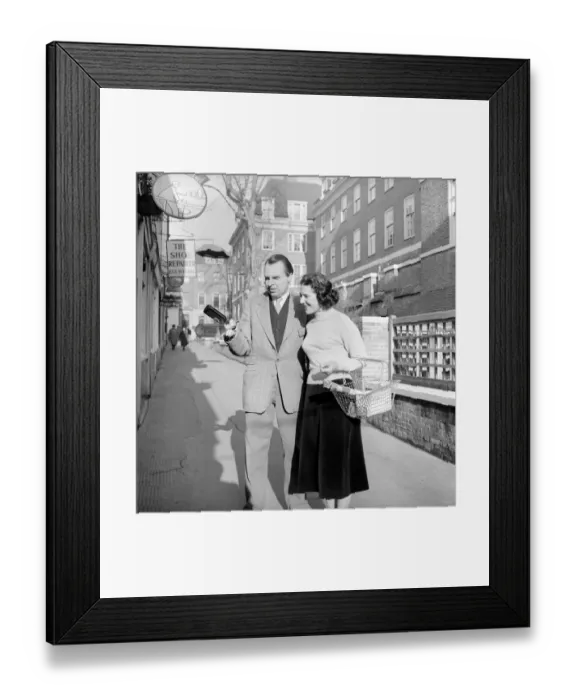 Framed Print : Couple Shopping: Nigel Kneale with his wife Judy Kerr seen here out shopping Framed Print : Couple Shopping: Nigel Kneale with his wife Judy Kerr seen here out shopping