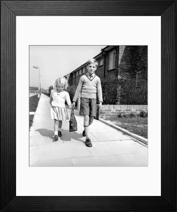 Framed Print : Brother and sister carry the shopping bag after running errands for mother. 1954 A228c
