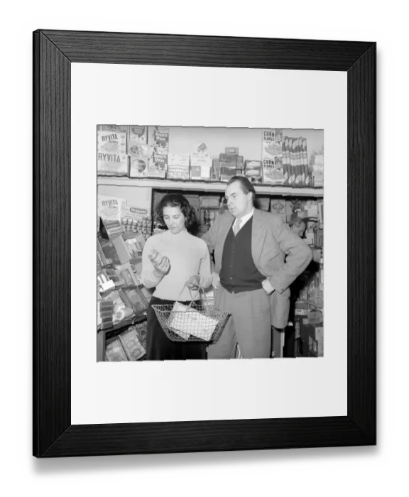 Framed Print : Couple Shopping: Nigel Kneale with his wife Judy Kerr seen here out shopping