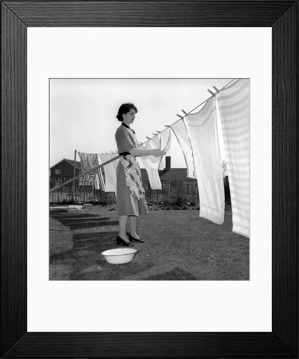 Framed Print : 1950s Housewife: Housework: The role of the housewife in 1954 was to prepare Framed Print : 1950s Housewife: Housework: The role of the housewife in 1954 was to prepare