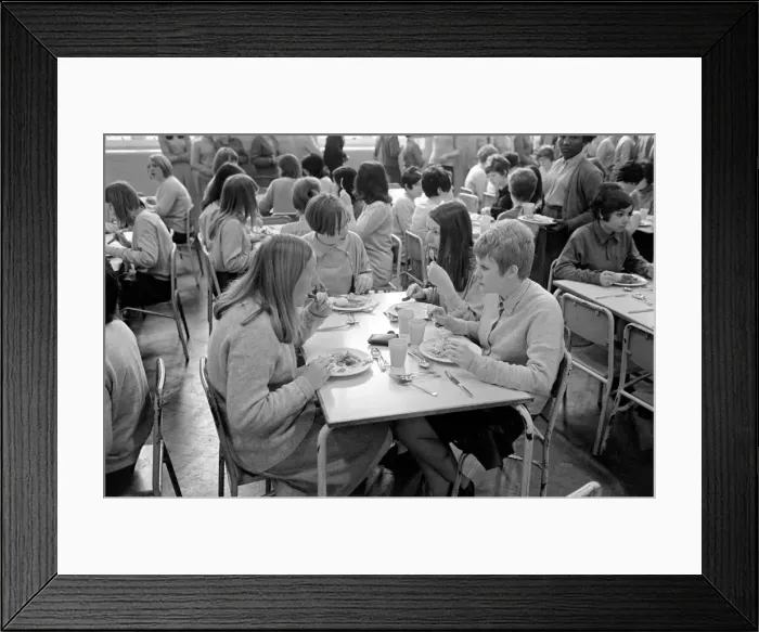 Framed Print : School Dinners. General scenes of school dinner. Ladies serving meal to pupils in Framed Print : School Dinners. General scenes of school dinner. Ladies serving meal to pupils in