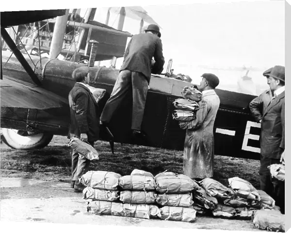 Daily Mirror newspaper being loaded onto a Vickers 100 aircraft for delivery to