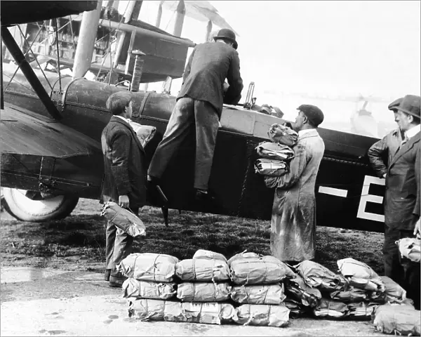 Daily Mirror newspaper being loaded onto a Vickers 100 aircraft for delivery to
