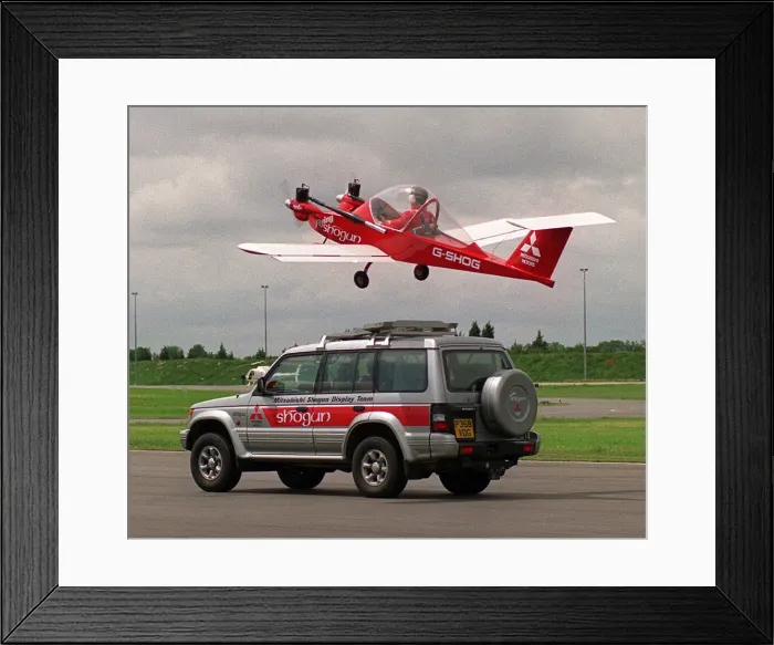 Framed Print : The Mitsubishi flying Shogun display team, in which a twin Cri Cri powered by motor mower Framed Print : The Mitsubishi flying Shogun display team, in which a twin Cri Cri powered by motor mower