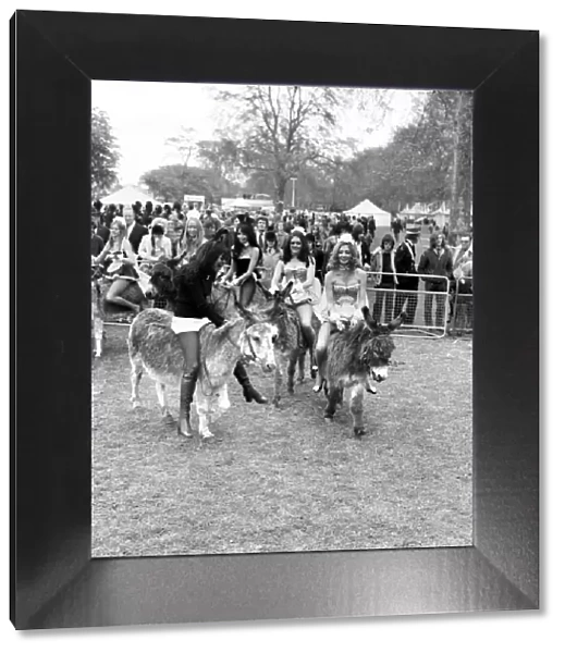 Donkey Derby held for charity at Festival Gardens. Bunny girls