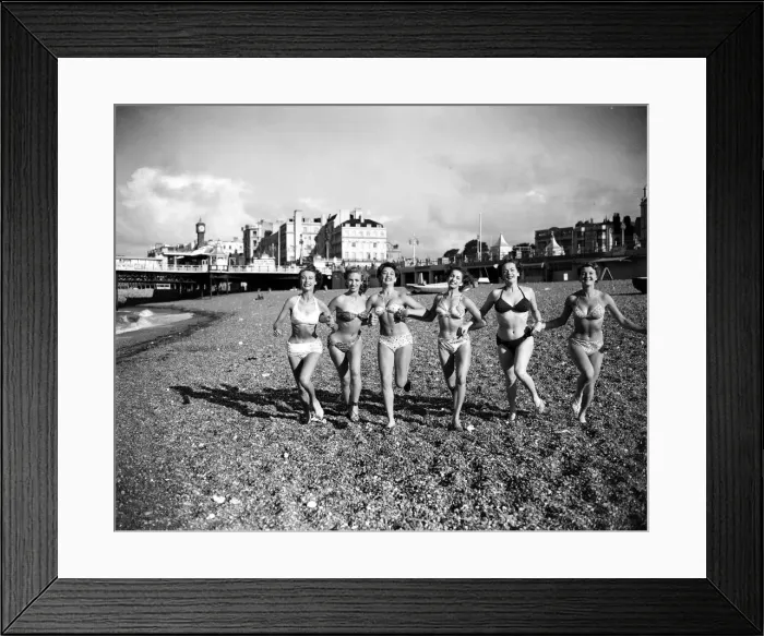 Framed Print : Friends ejoying the early spring sunshine on Brighton beach. Circa April 1952 Framed Print : Friends ejoying the early spring sunshine on Brighton beach. Circa April 1952
