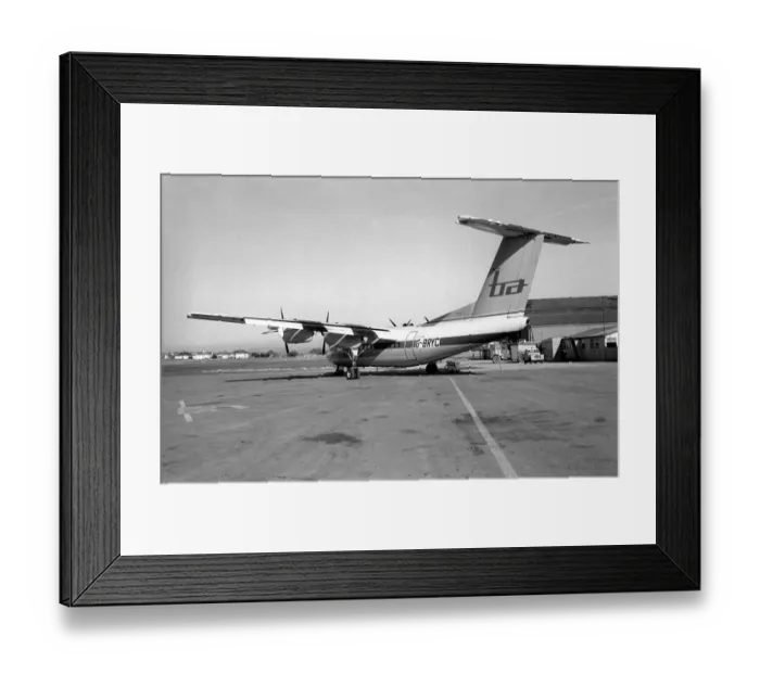 Framed Print : A Brymon airlines Dash 7 aircraft at London City Airport. February 1987