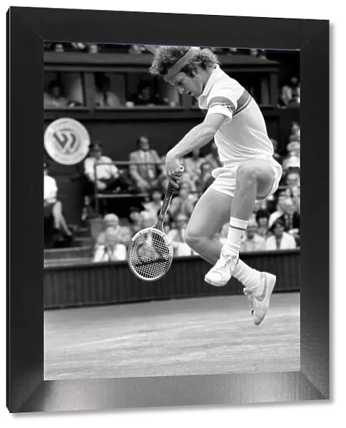Sport: Tennis. John McEnroe gets an tied up in his Centre Court Wining Wimbledon Semi
